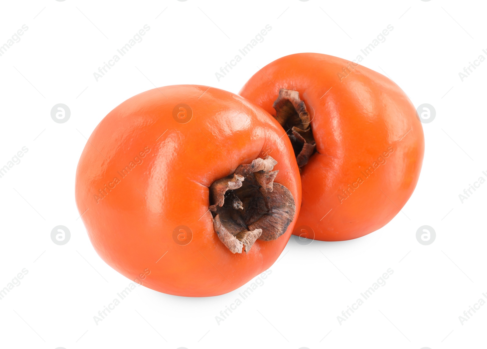 Photo of Delicious ripe juicy persimmons isolated on white