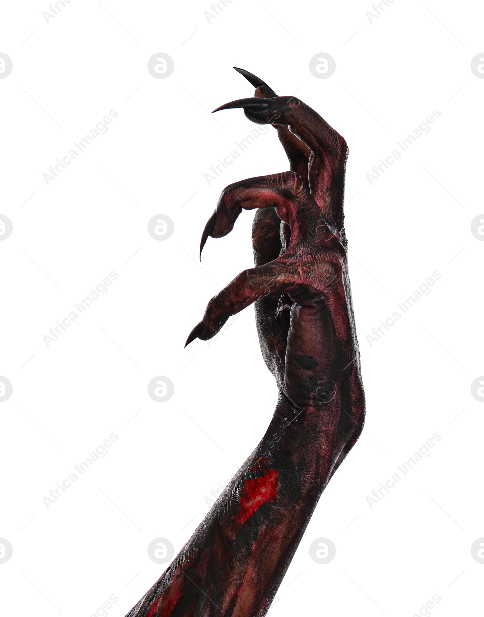 Photo of Scary monster on white background, closeup of hand. Halloween character