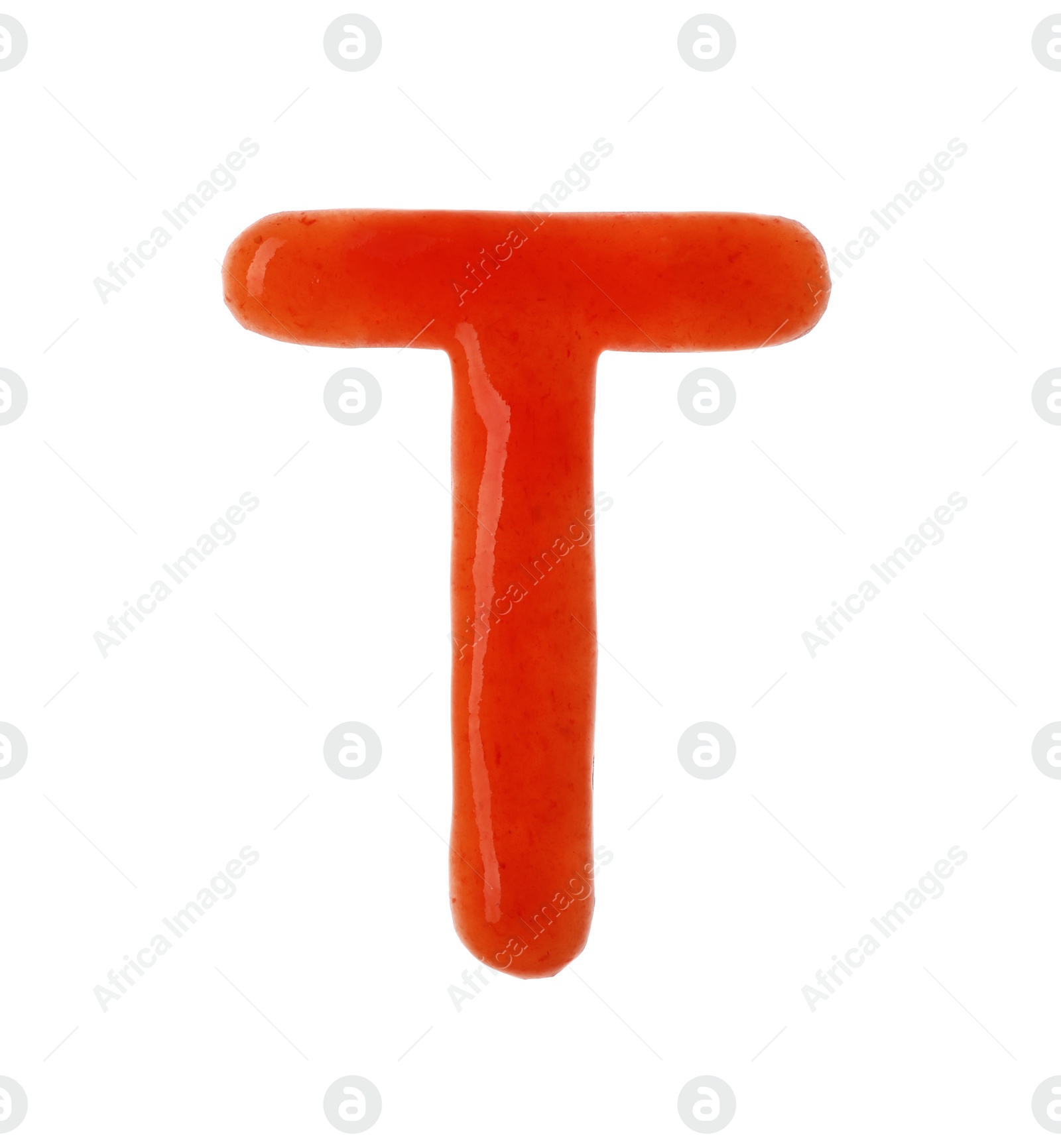 Photo of Letter T written with red sauce on white background