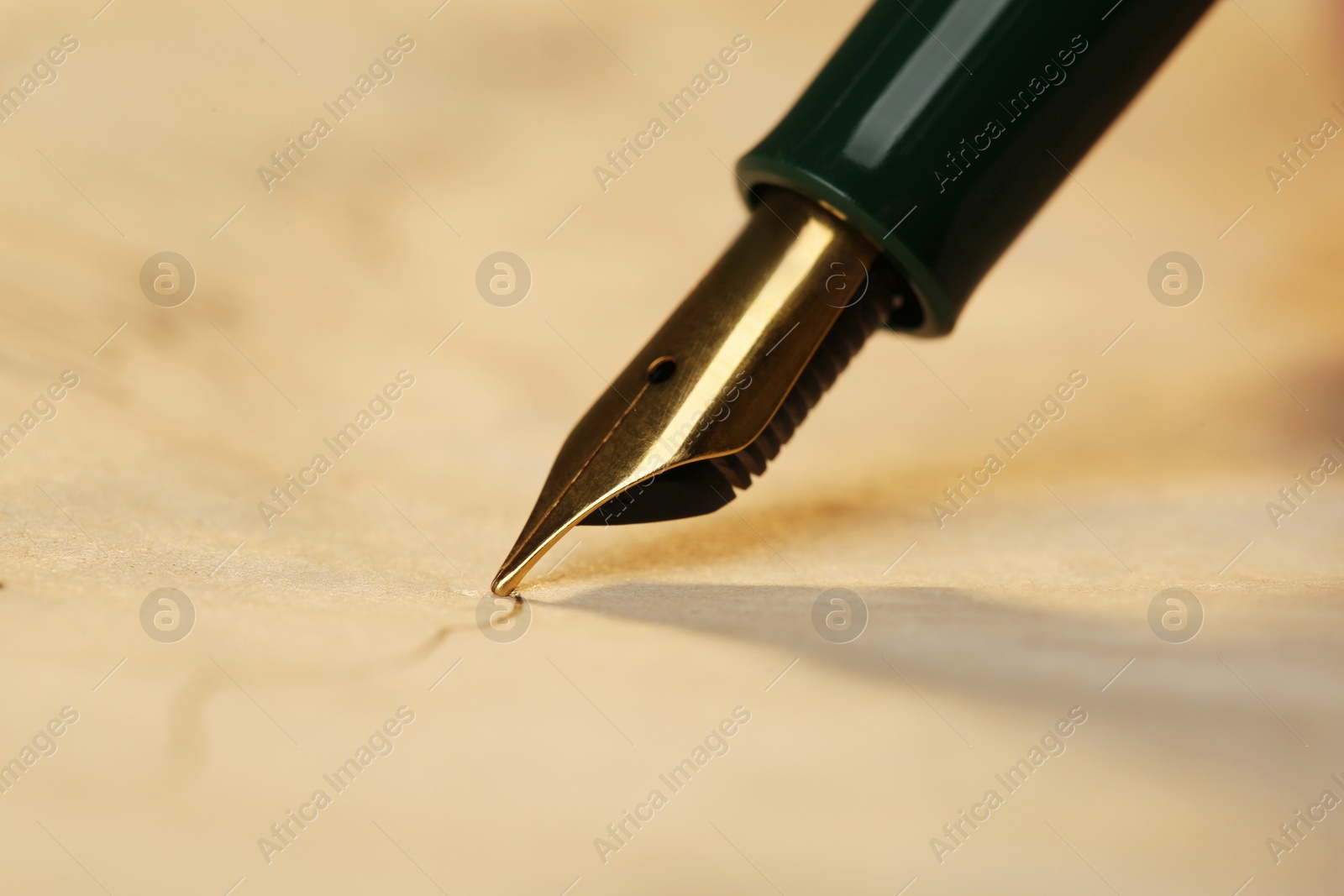 Photo of Drawing line with beautiful fountain pen, closeup