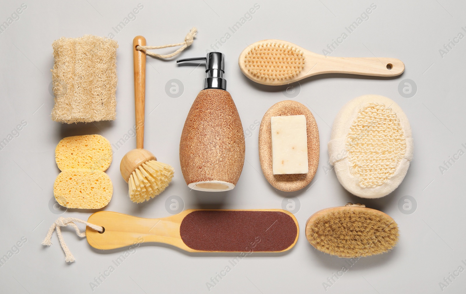 Photo of Bath accessories. Flat lay composition with personal care tools on light grey background