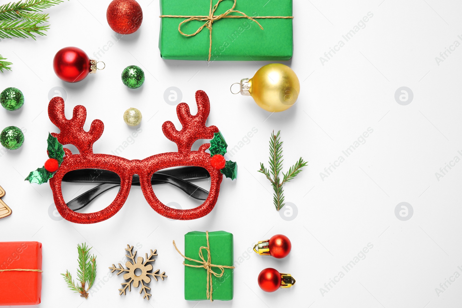 Photo of Flat lay composition with Christmas items on white background