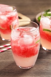 Delicious refreshing watermelon drink on wooden table