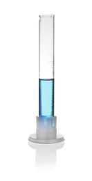 Graduated cylinder with blue liquid on table against white background. Laboratory analysis