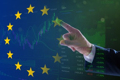 Image of Stock exchange. Double exposure with European flag and man using digital screen with trading data and graphs