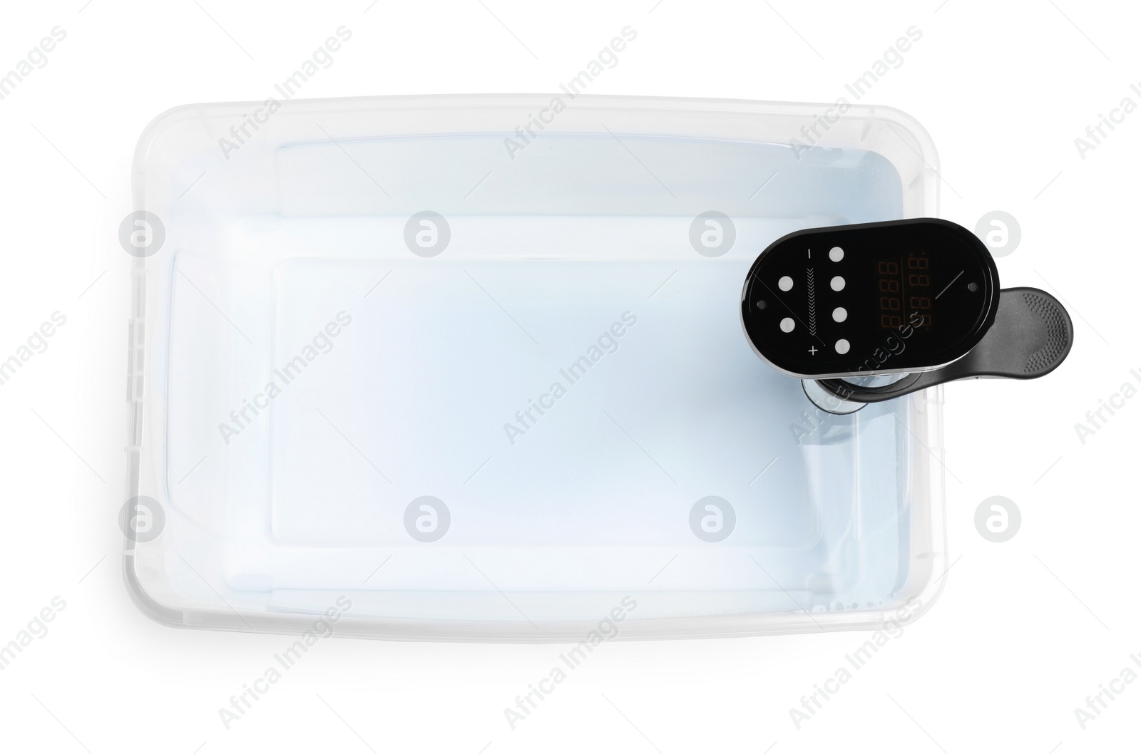 Photo of Thermal immersion circulator in plastic container with water isolated on white, top view. Sous vide cooker