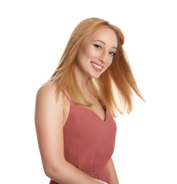 Portrait of beautiful young woman with blonde hair on white background