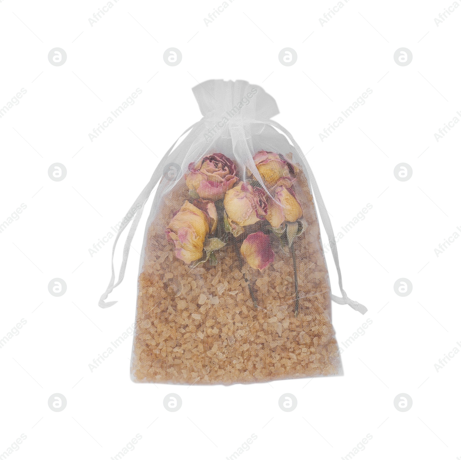 Photo of Scented sachet with dried rose flowers isolated on white, top view