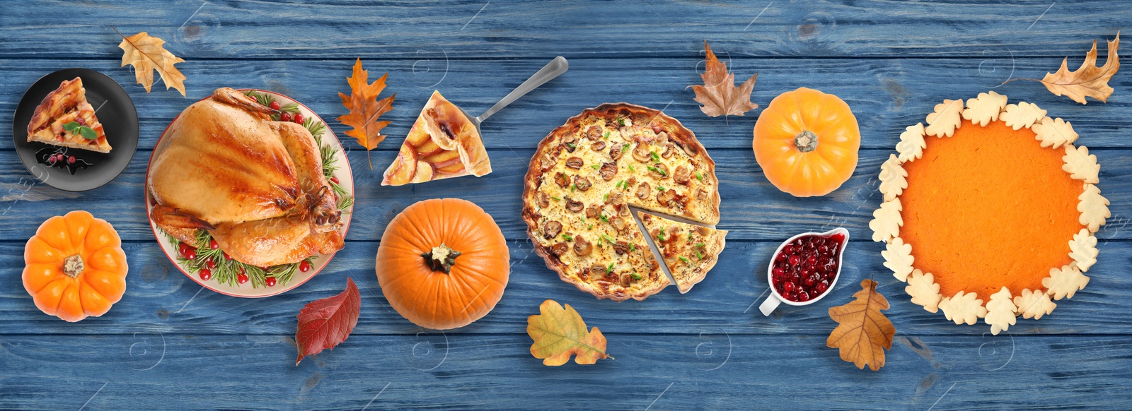 Image of Flat lay composition with different tasty pies on blue wooden table. Banner design