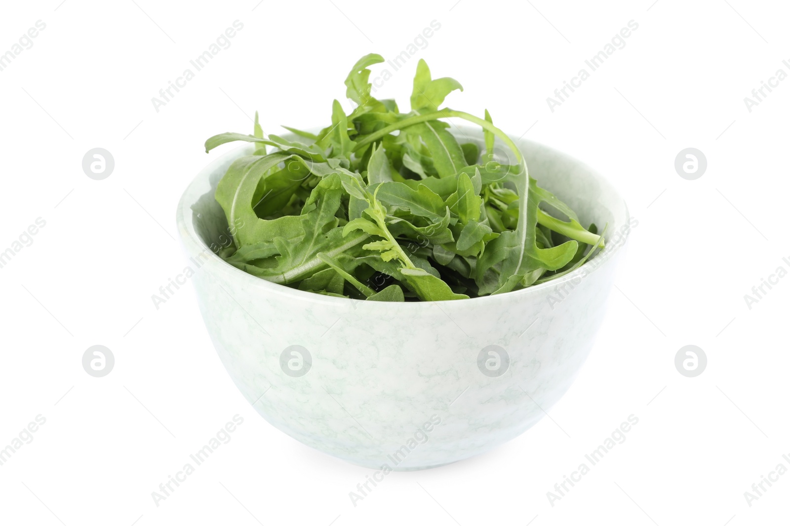 Photo of Delicious fresh arugula in bowl isolated on white