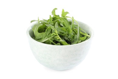 Photo of Delicious fresh arugula in bowl isolated on white