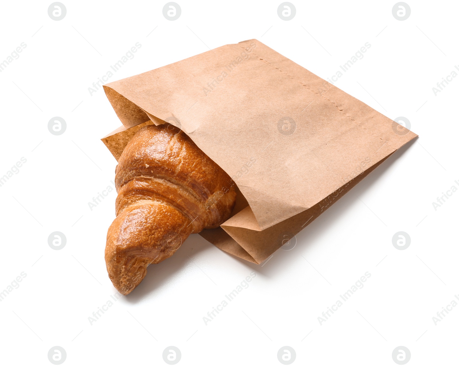 Photo of Paper bag with croissant on white background. Space for design