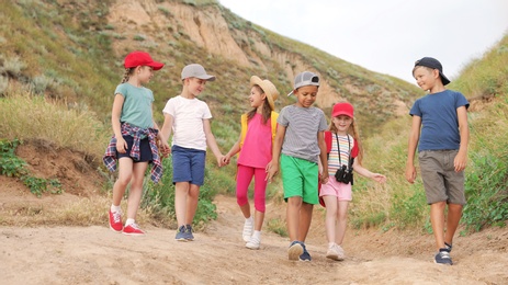 Cute little children outdoors on summer day. Camping trip