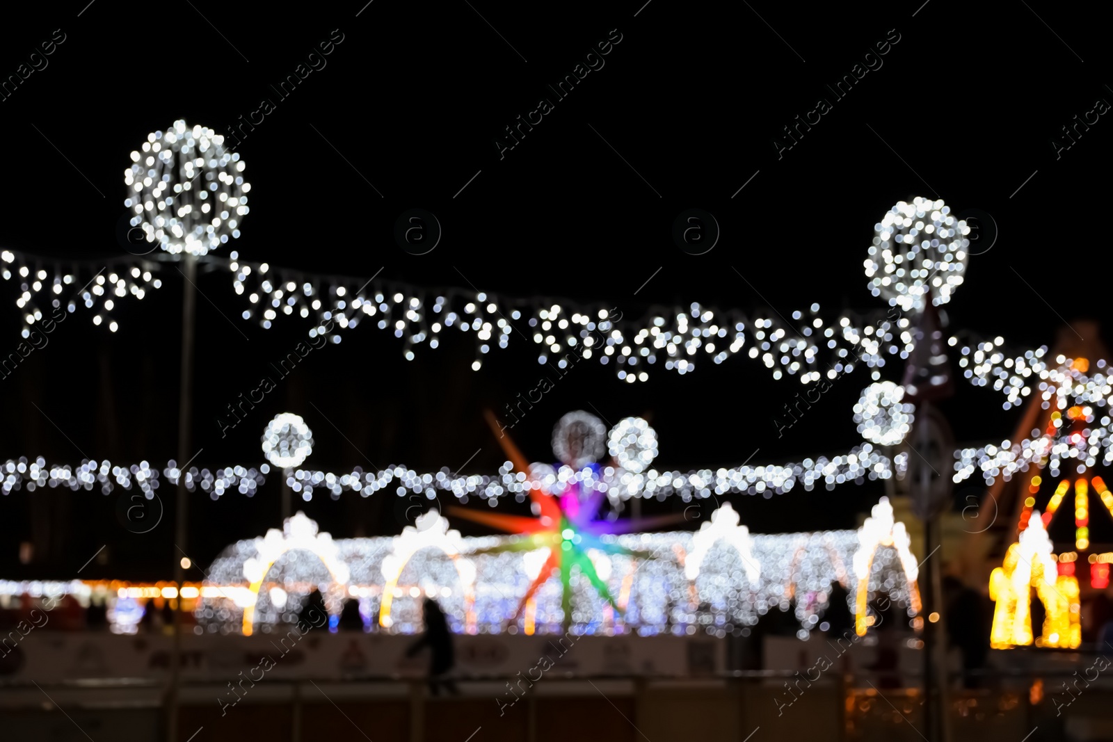 Photo of Beautiful street lights at night. Bokeh effect