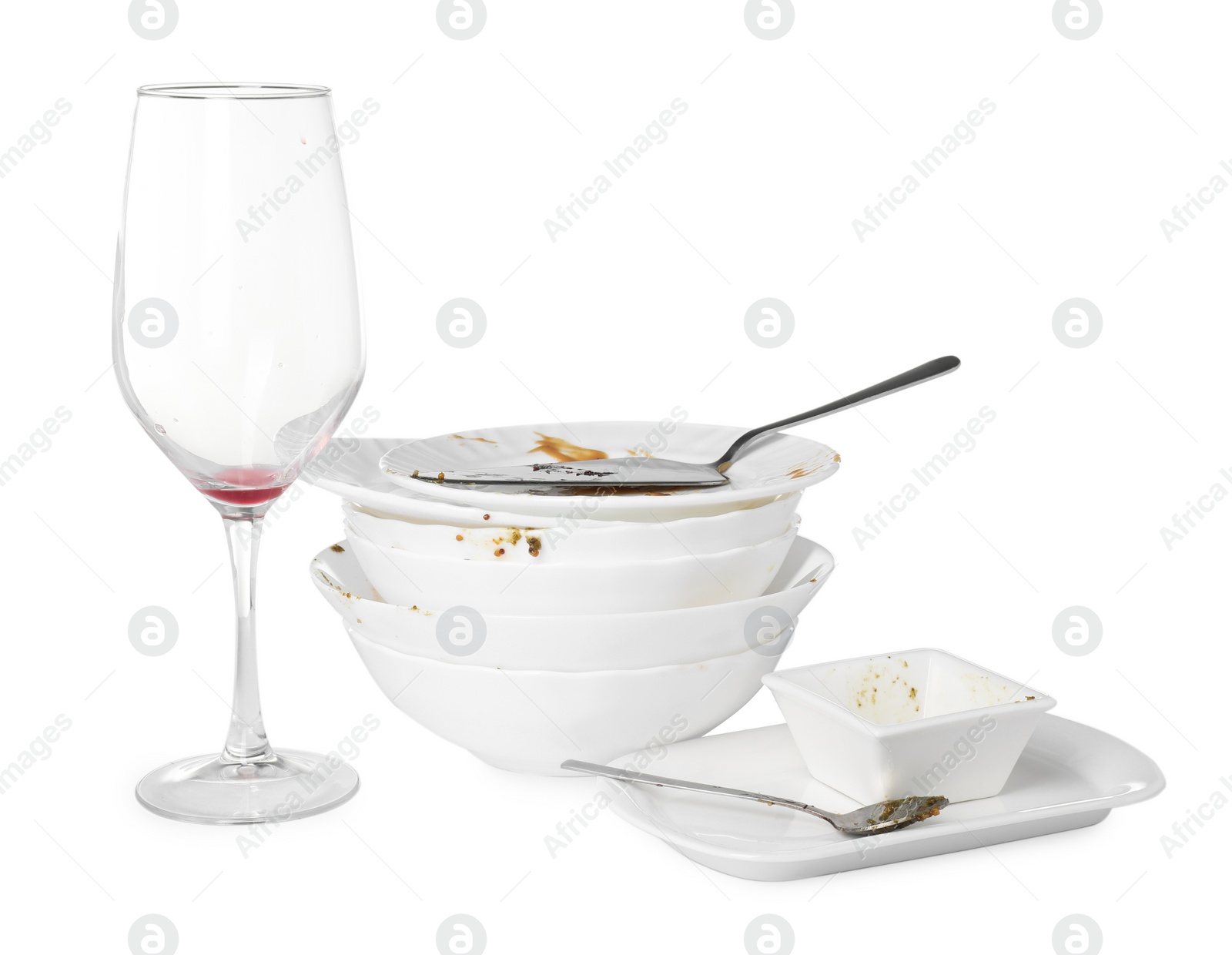 Photo of Set of dirty dishes isolated on white