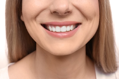 Young woman with beautiful smile, closeup. Teeth whitening