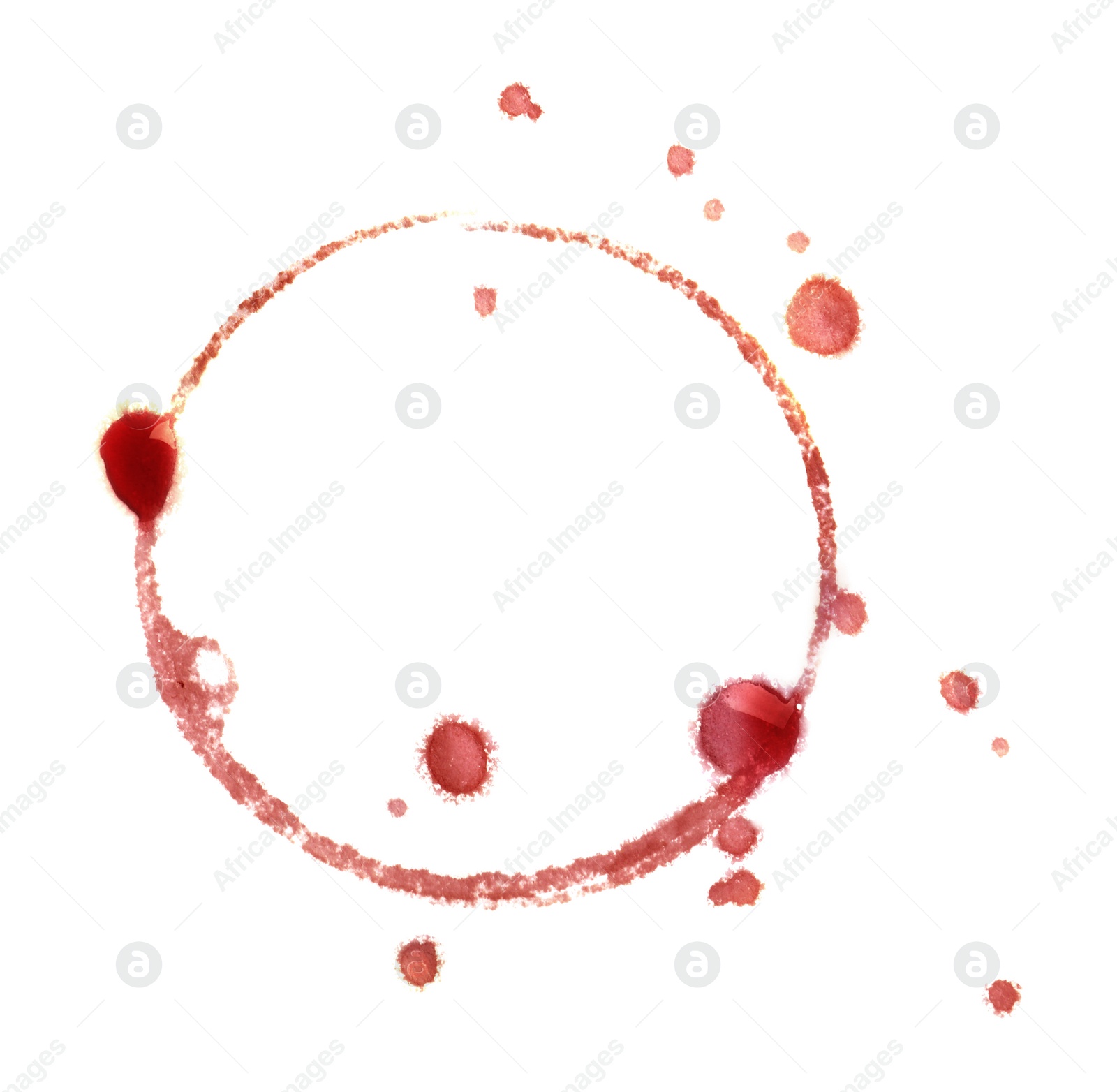 Photo of Red wine ring and drops on white background, top view