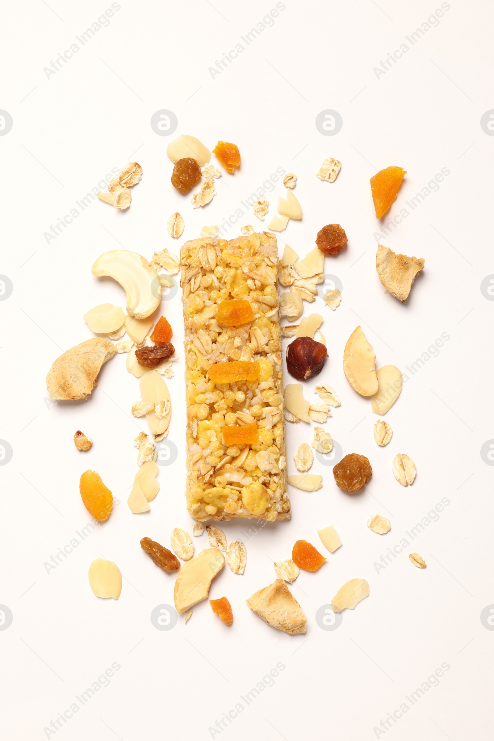 Photo of Tasty granola bar and ingredients isolated on white, top view