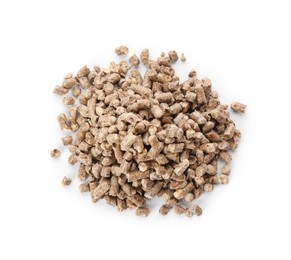 Photo of Pile of wood cat litter isolated on white, top view