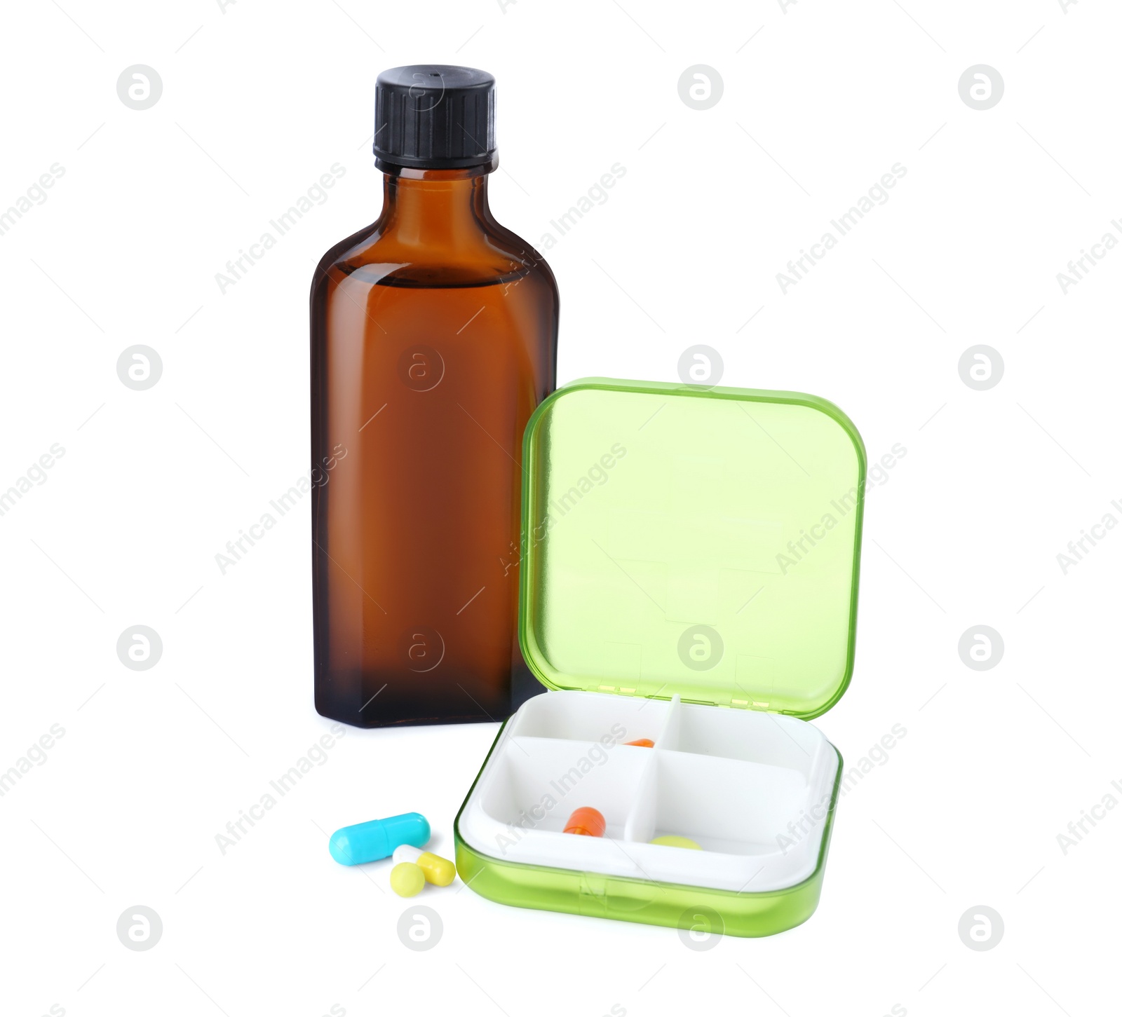 Photo of Bottle of syrup with pills on white background. Cough and cold medicine