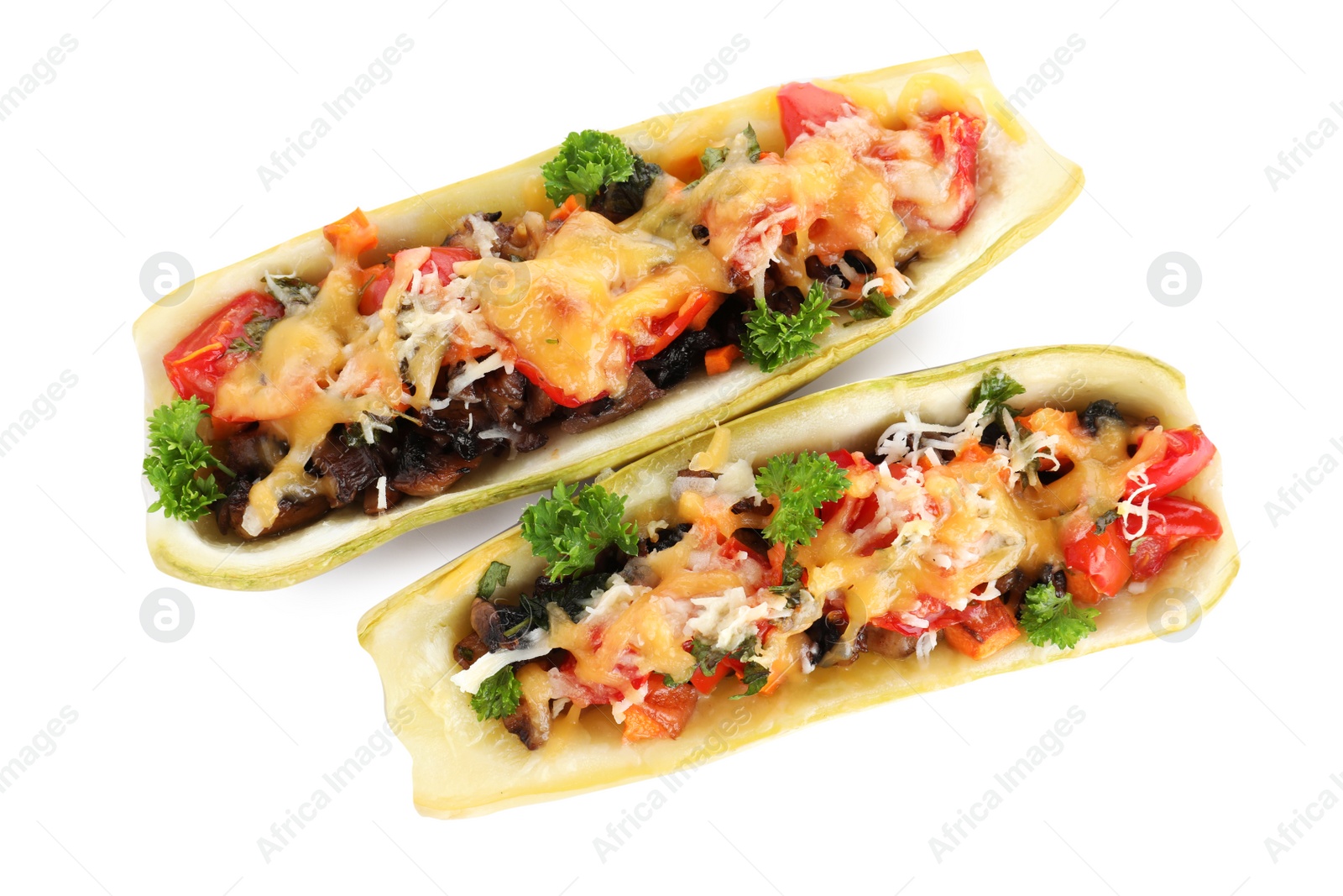 Photo of Delicious baked stuffed zucchini on white background, top view