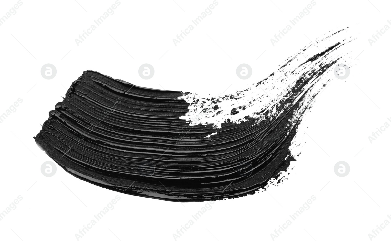 Photo of Brushstrokes of black oil paint on white background, top view