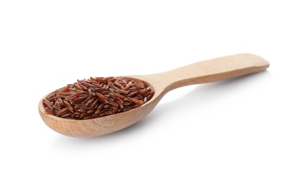 Photo of Wooden spoon with brown rice on white background