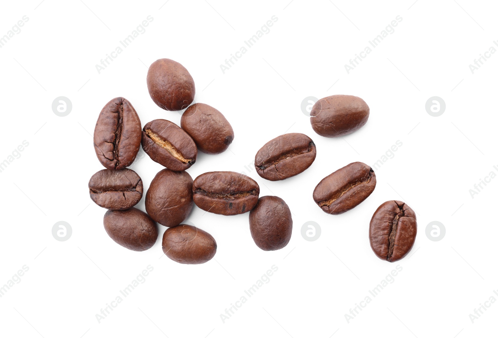 Photo of Many roasted coffee beans isolated on white, top view