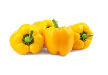 Ripe yellow bell peppers isolated on white