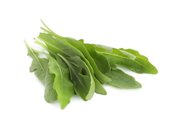 Fresh green arugula leaves on white background