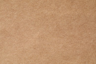 Texture of kraft paper sheet as background, closeup