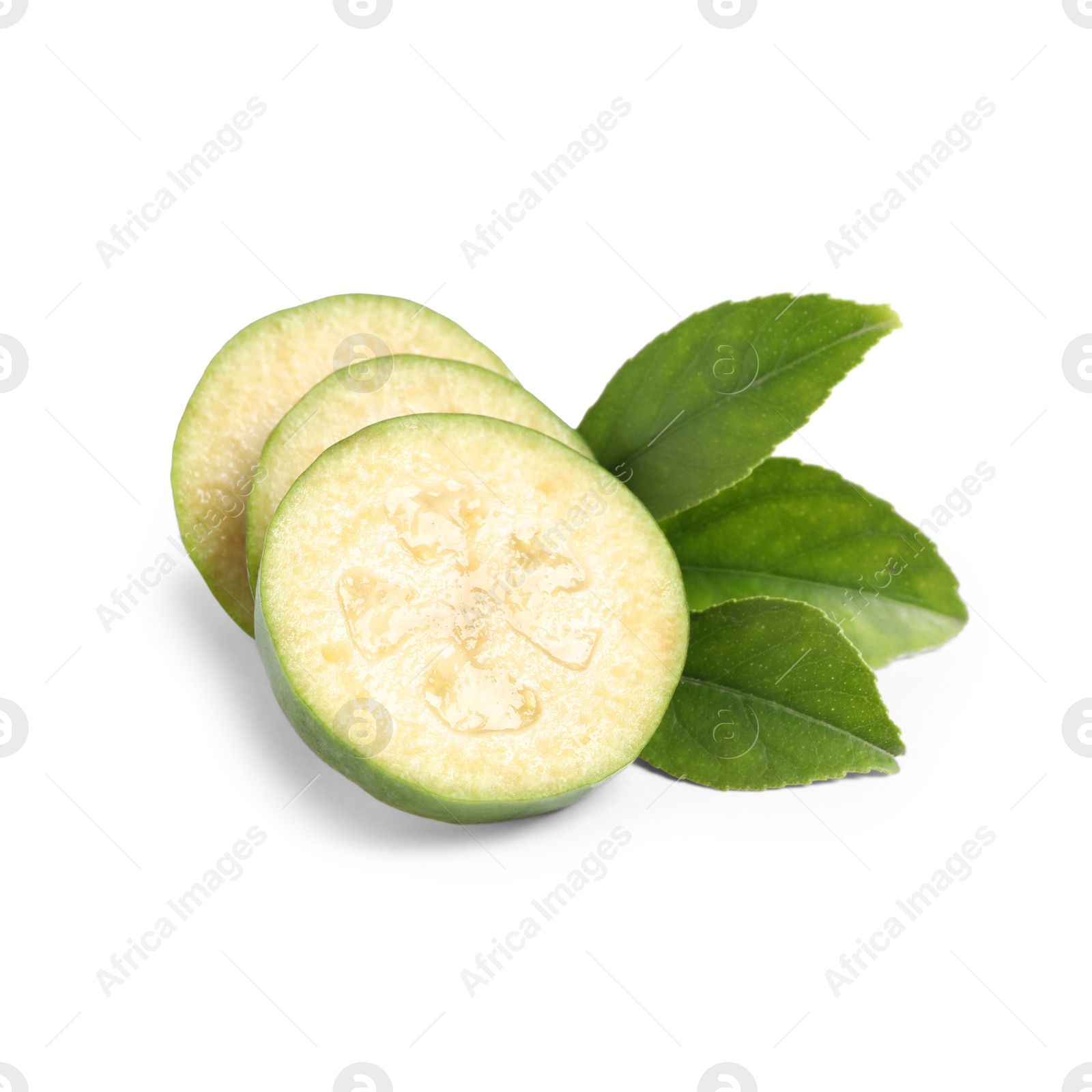 Photo of Slices of fresh feijoa fruit and leaves on white background