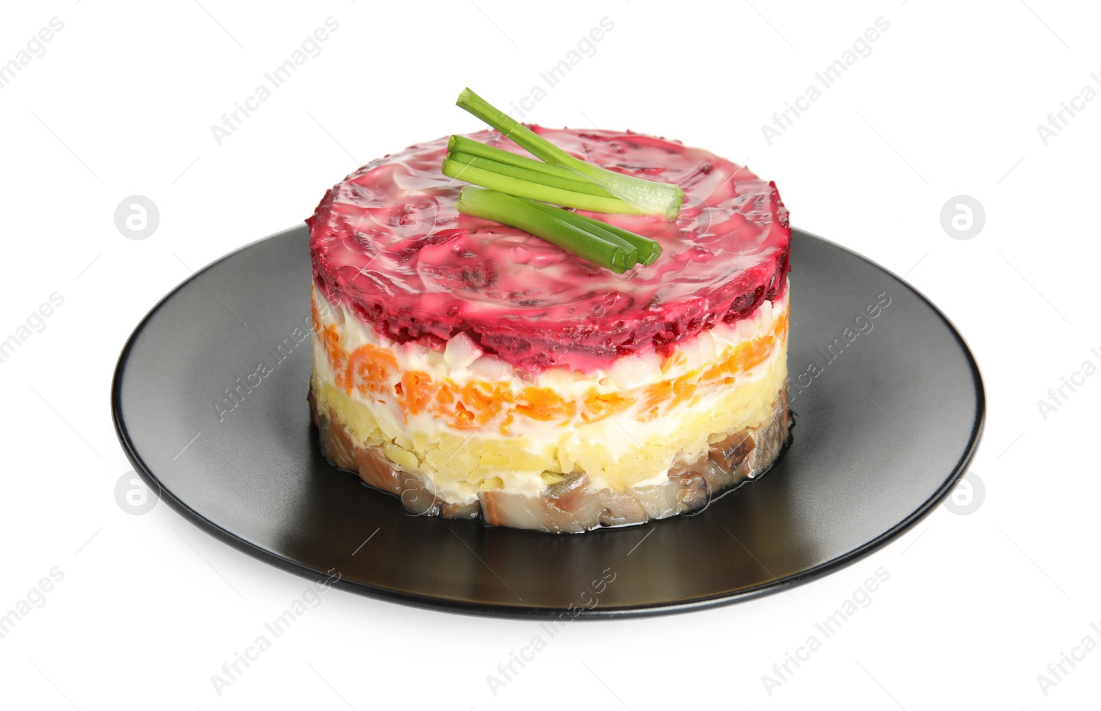 Photo of Herring under fur coat isolated on white. Traditional russian salad