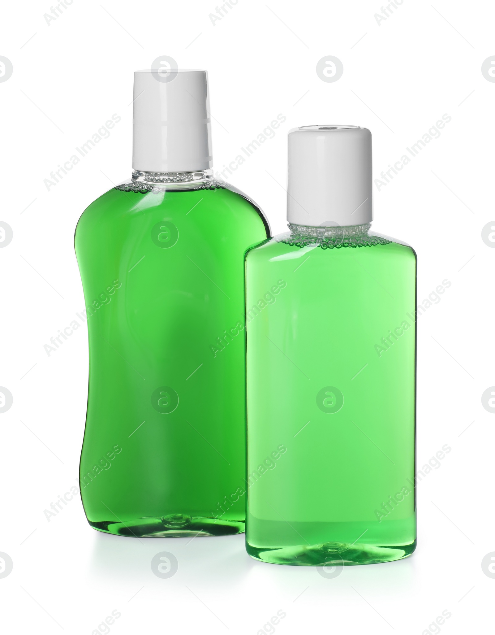 Photo of Two bottles of mouthwash isolated on white
