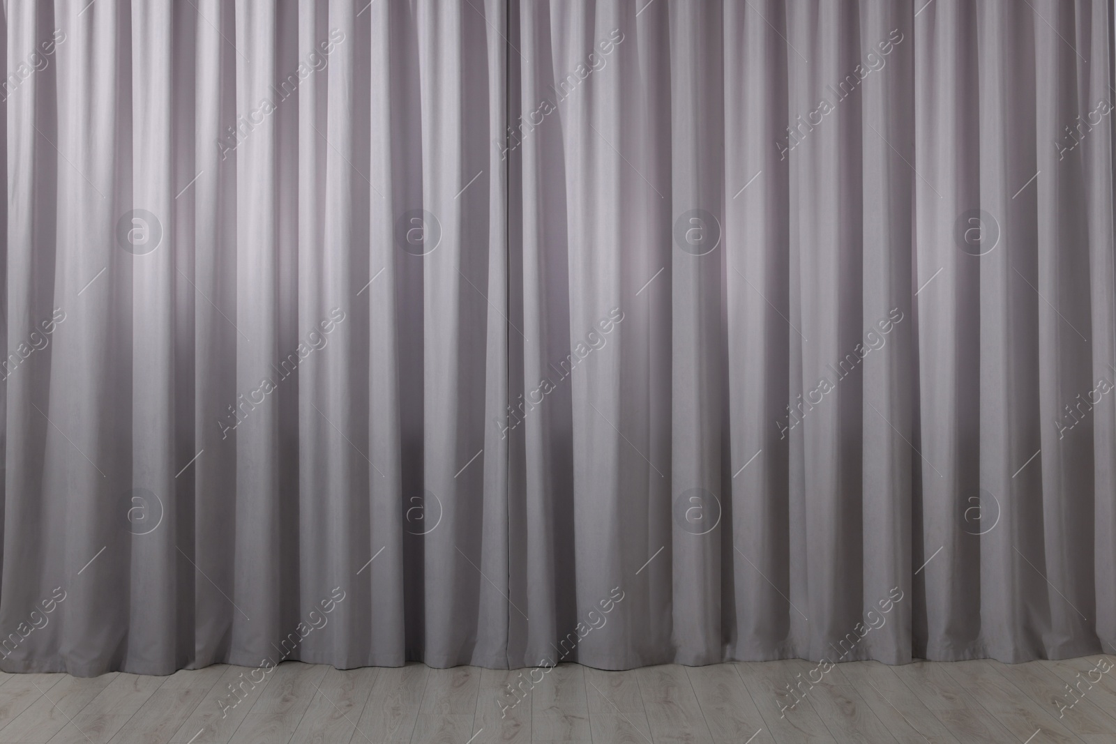 Photo of Light grey window curtains in living room