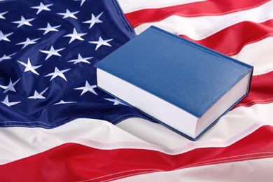Photo of Blue hardcover book on national American flag