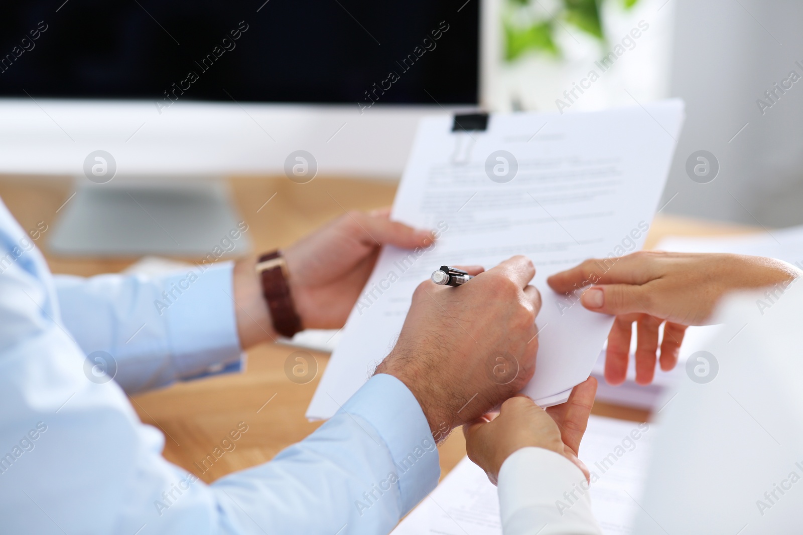 Photo of Businesspeople working with documents in office, closeup