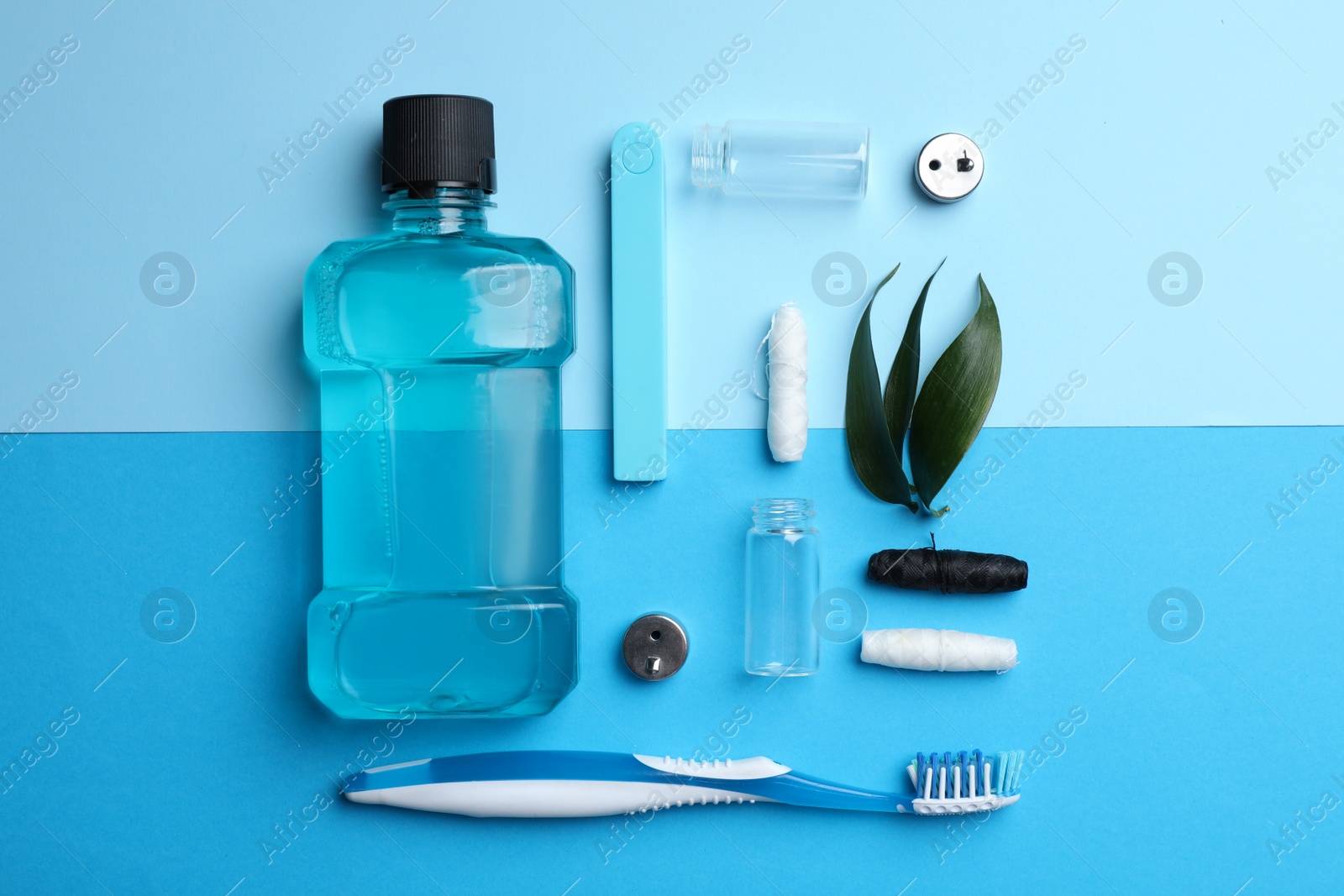 Photo of Different oral hygiene products on color background, flat lay