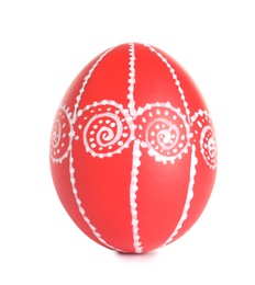 Photo of Creative painted red Easter egg on white background