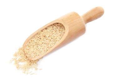 Photo of Scoop with raw unpolished rice on white background