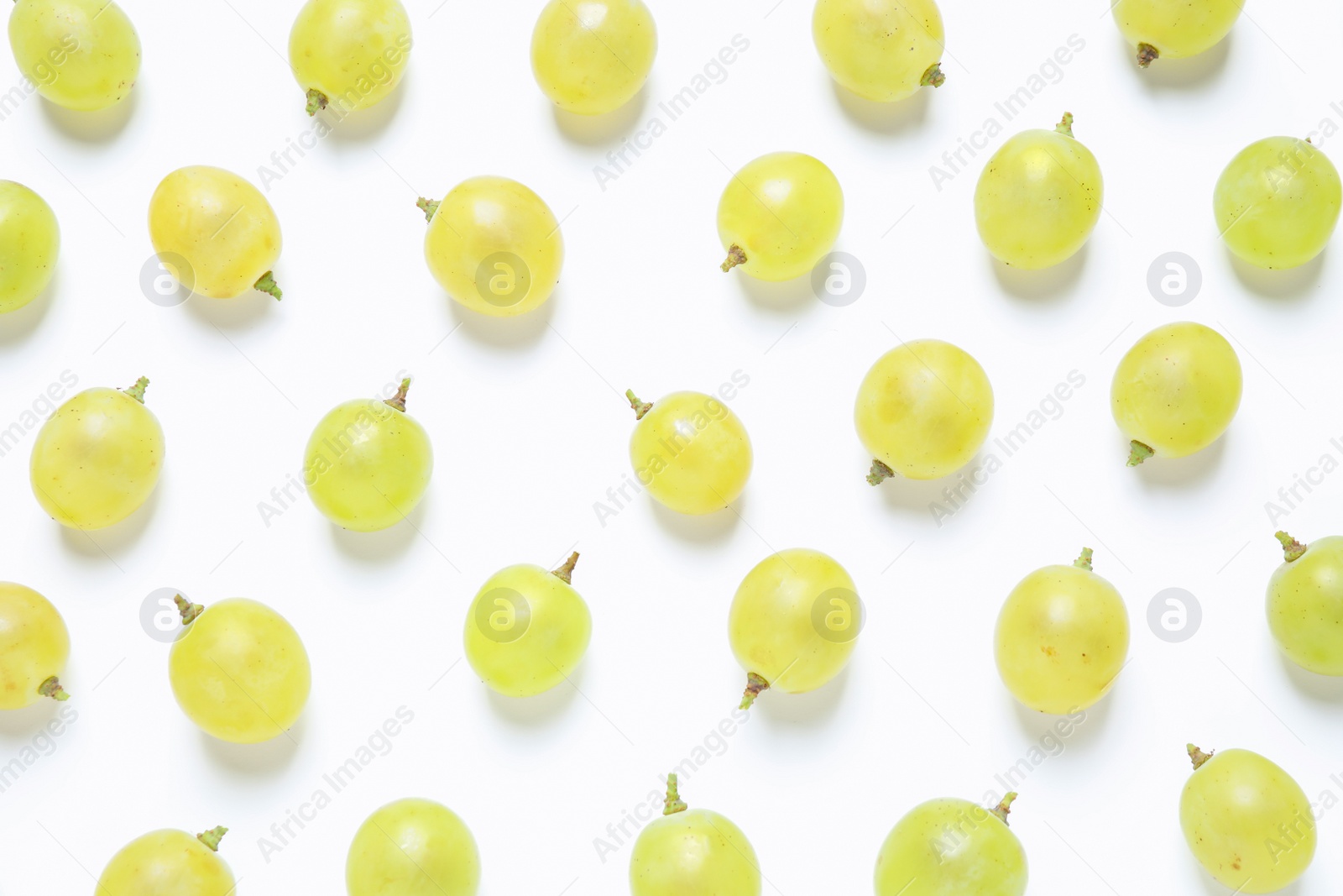 Photo of Fresh ripe juicy grapes on white background, top view