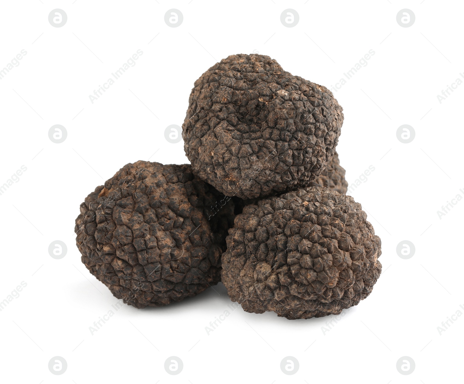 Photo of Fresh whole black truffles isolated on white