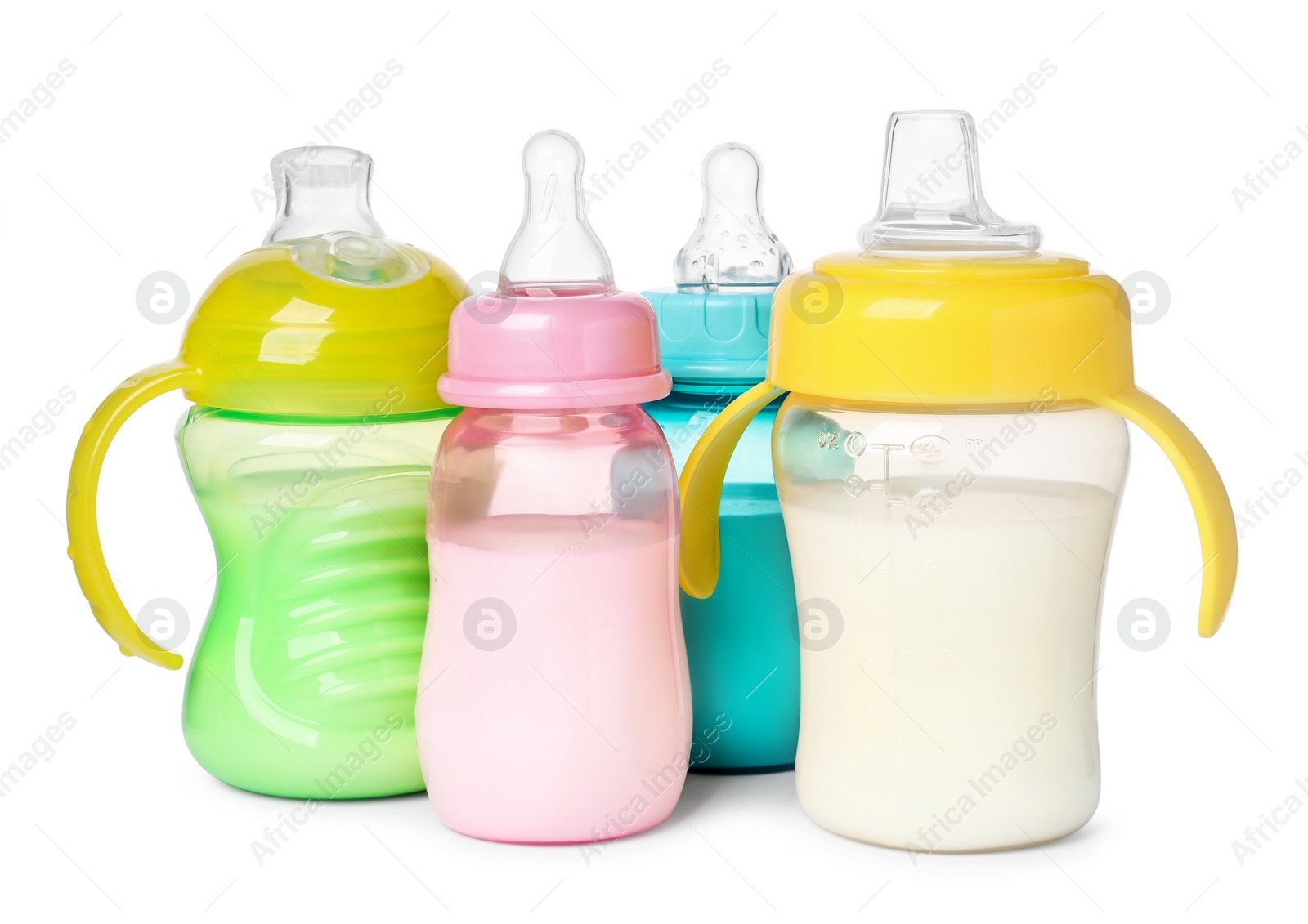 Photo of Feeding bottles with milk on white background