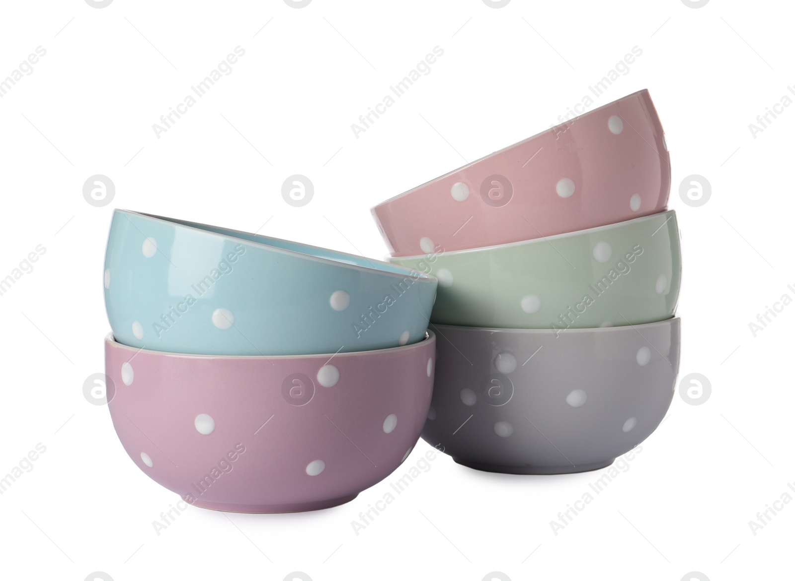 Photo of Set of beautiful ceramic bowls isolated on white