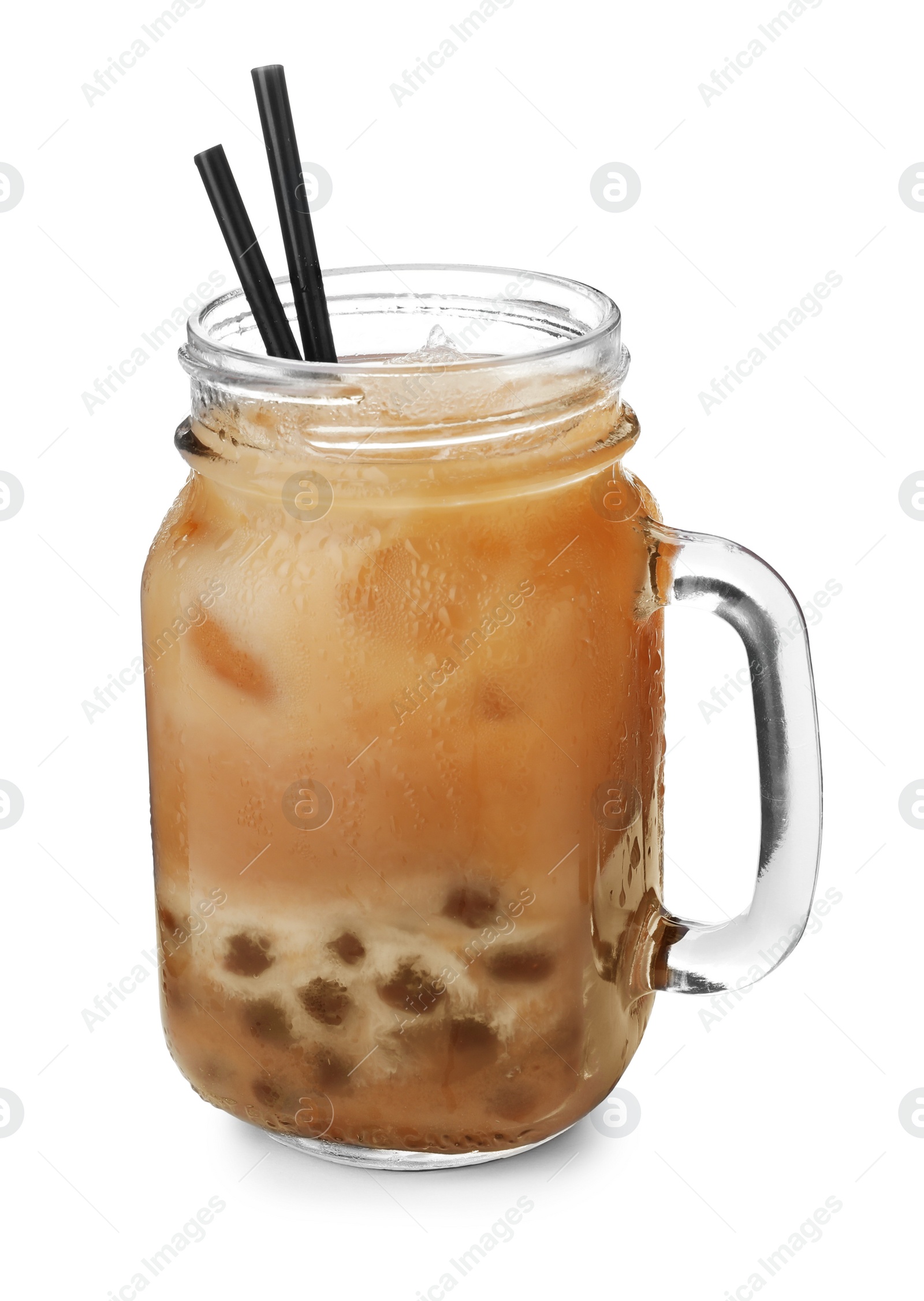 Photo of Tasty brown milk bubble tea in mason jar isolated on white