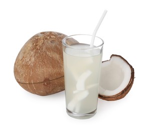 Glass of coconut water and nuts isolated on white