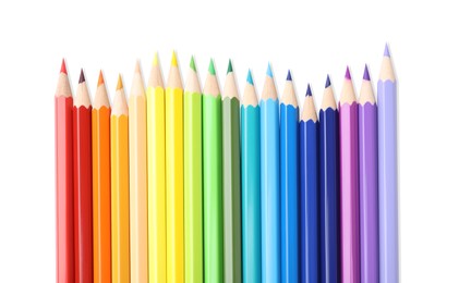 Many colorful wooden pencils on white background, top view