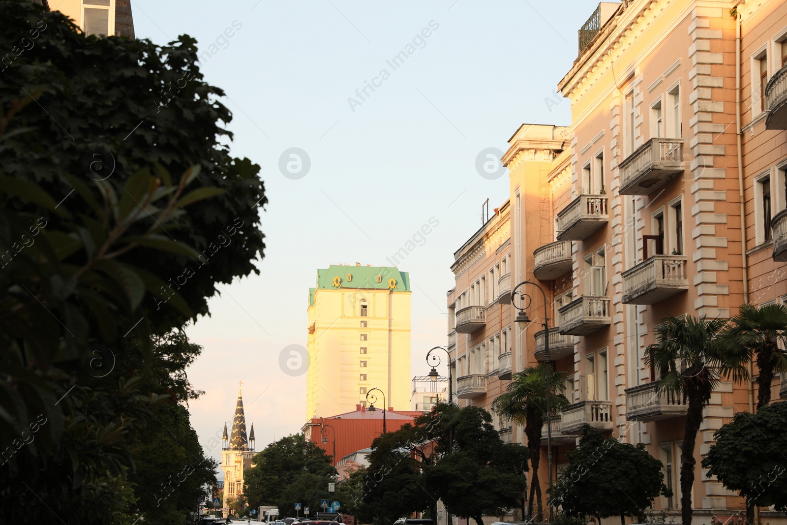 Photo of Batumi, Georgia - August 16, 2022: Beautiful city street with buildings and trees