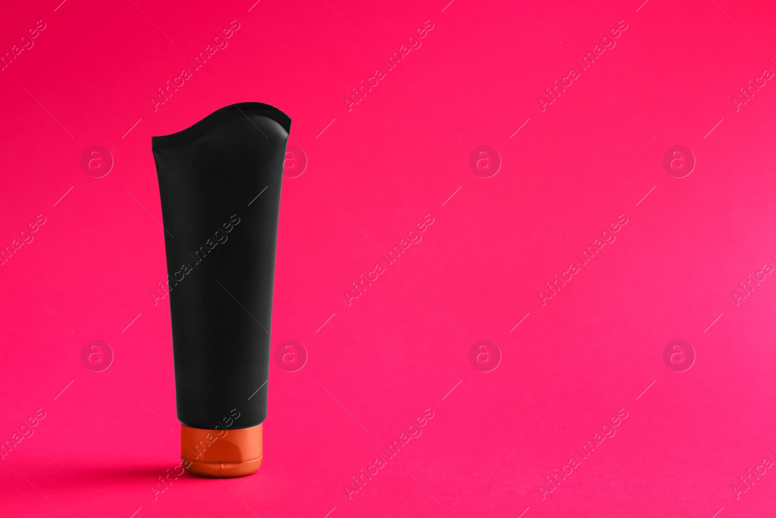 Photo of Men's cosmetic product on color background. Space for design