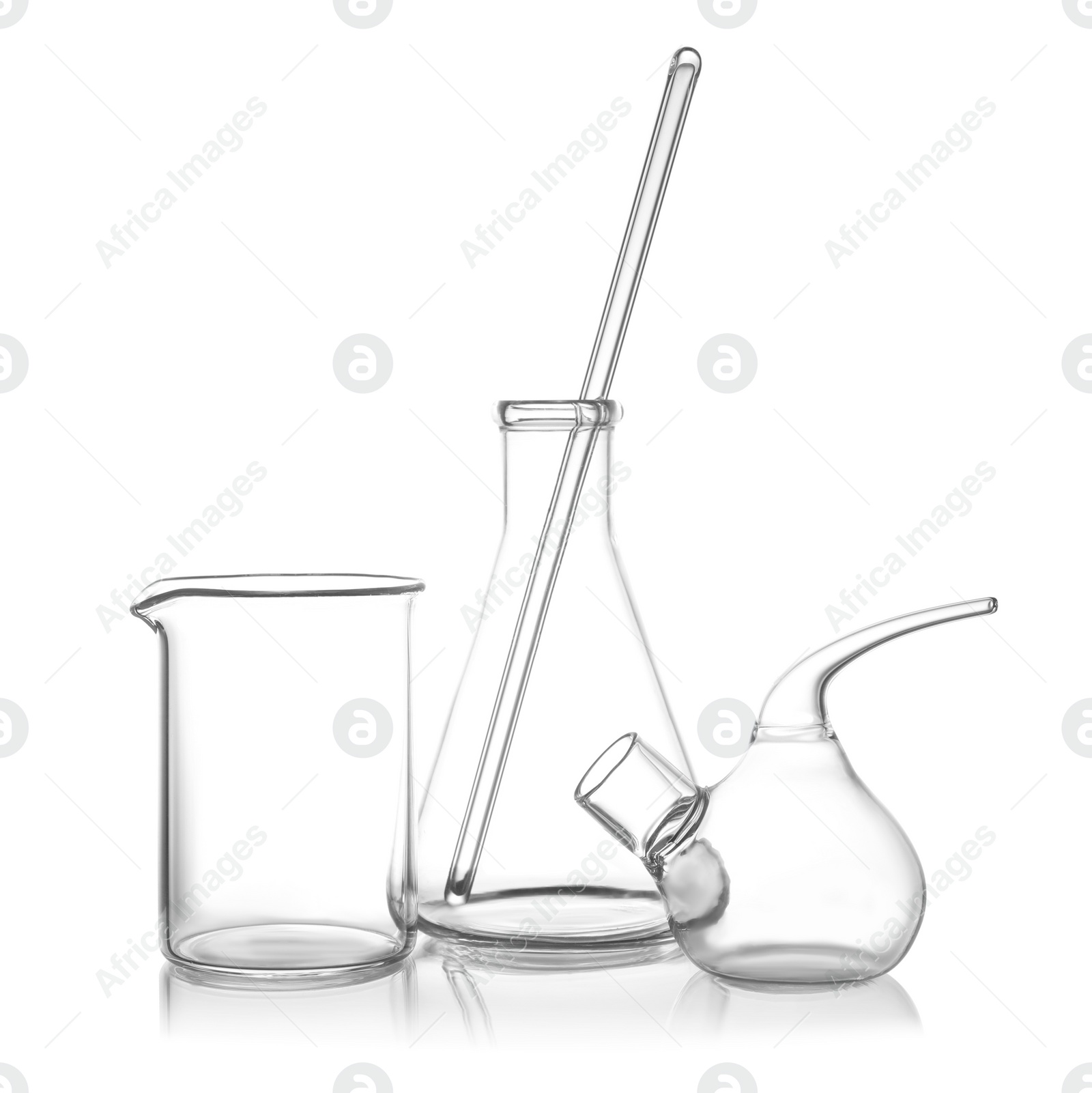 Photo of Clean empty laboratory glassware on white background